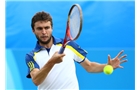 EASTBOURNE, ENGLAND - JUNE 22:  Gilles Simon of France in action during his men's singles final match against Feliciano Lopez of Spain on day eight of the AEGON International tennis tournament at Devonshire Park on June 22, 2013 in Eastbourne, England.  (Photo by Jan Kruger/Getty Images)